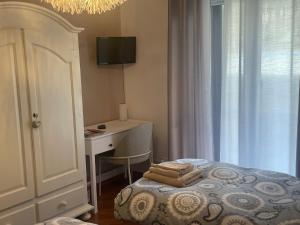 Łóżko lub łóżka w pokoju w obiekcie Bed & Breakfast con vista giardino e piscina