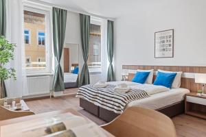 Postel nebo postele na pokoji v ubytování K22 Smart Rooms