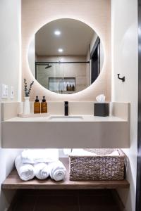 a bathroom with a sink and a mirror at The Estes Park Resort in Estes Park +51 photos