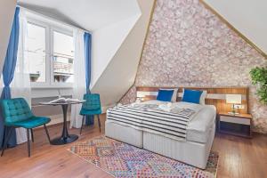 Postel nebo postele na pokoji v ubytování K22 Smart Rooms