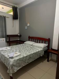 Ένα ή περισσότερα κρεβάτια σε δωμάτιο στο Suites Brejauva +8 φωτογραφίες