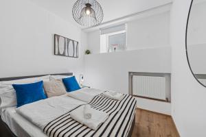 Postel nebo postele na pokoji v ubytování K22 Smart Rooms