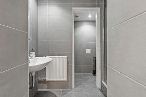 Koupelna v ubytování K22 Smart Rooms