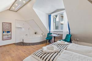 Postel nebo postele na pokoji v ubytování K22 Smart Rooms