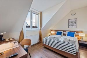 Postel nebo postele na pokoji v ubytování K22 Smart Rooms