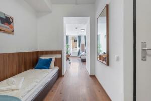 Postel nebo postele na pokoji v ubytování K22 Smart Rooms