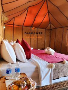 Postel nebo postele na pokoji v ubytování Diamante Luxury Camp