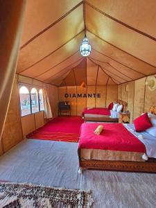 Postel nebo postele na pokoji v ubytování Diamante Luxury Camp