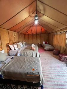 Postel nebo postele na pokoji v ubytování Diamante Luxury Camp