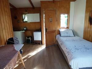 Postel nebo postele na pokoji v ubytování Rincón de los Cerezos