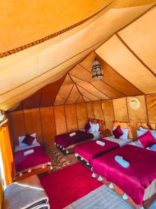 Postel nebo postele na pokoji v ubytování Diamante Luxury Camp
