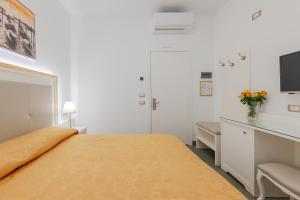 Posteľ alebo postele v izbe v ubytovaní Hotel Marte
