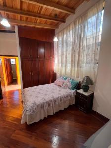 Postel nebo postele na pokoji v ubytování La Casa Ambateña