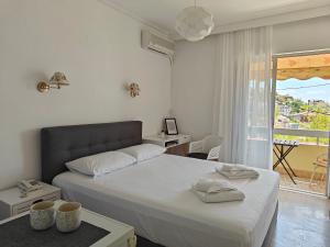 Postel nebo postele na pokoji v ubytování Hotel Rania + 37 fotografií