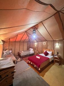 Postel nebo postele na pokoji v ubytování Diamante Luxury Camp