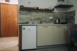 a kitchen with a sink and a dishwasher at Darki Apartments 3 - Very Central Stay With Free Parking in Ohrid