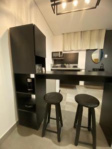 Η κουζίνα ή μικρή κουζίνα στο Comfort Studio