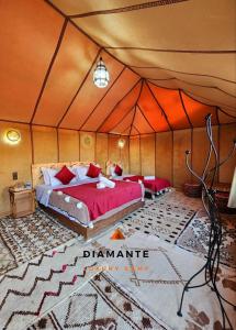 Postel nebo postele na pokoji v ubytování Diamante Luxury Camp