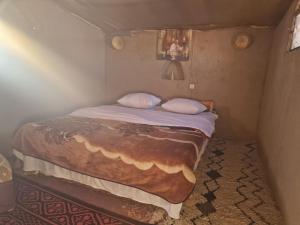 Postel nebo postele na pokoji v ubytování Camel House camp