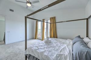 a bedroom with a bed and a large window at Agave Luxe Home - 8 Mi to Downtown in Austin