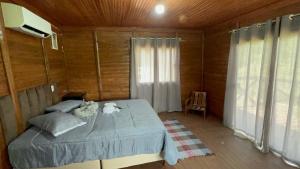 Postel nebo postele na pokoji v ubytování Loft do Lessa