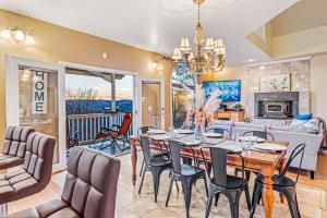 a dining room with a table and chairs at Majestic River Castle, A Fairytale Escape on the Coosawatee River in Ellijay