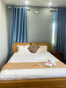 Postel nebo postele na pokoji v ubytování Gao Hotel