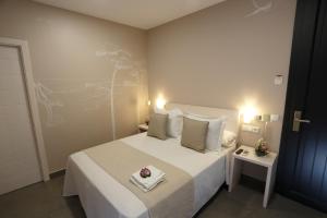 Postel nebo postele na pokoji v ubytování La Pasajera Hostal Boutique