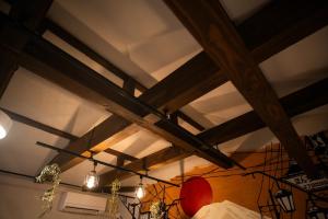 a chandelier hanging from the ceiling of a room at 将 -show- in Fujiyoshida