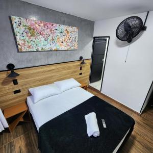 Postel nebo postele na pokoji v ubytování Alojamiento Cau