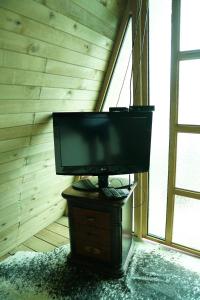 TV i/ili multimedijalni sistem u objektu Chalet El Pinal - Copacabana