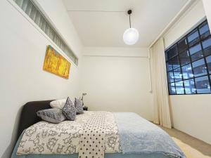 Ένα ή περισσότερα κρεβάτια σε δωμάτιο στο Auckland city Center large space 6 meters high Easy parking +12 φωτογραφίες