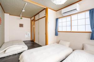 Domus OZONEにあるベッド