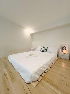 Ένα ή περισσότερα κρεβάτια σε δωμάτιο στο THE KABIN LOFT in Pampanga +17 φωτογραφίες