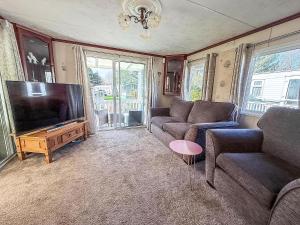 A television and/or entertainment centre at Lovely Caravan With Large Decking At Southview Holiday Park Ref 33108S