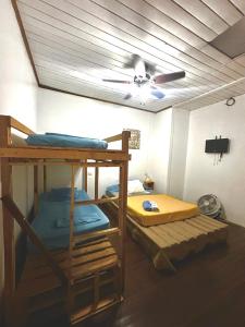 Postel nebo postele na pokoji v ubytování Hotel Cortez Azul