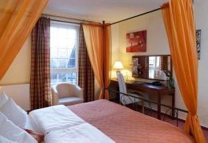 Ένα ή περισσότερα κρεβάτια σε δωμάτιο στο Hotel Villa Magnolia +2 φωτογραφίες