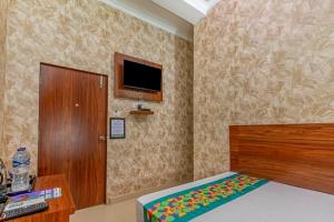 Ένα ή περισσότερα κρεβάτια σε δωμάτιο στο Treebo Una Regency - Near AIIMS Patna