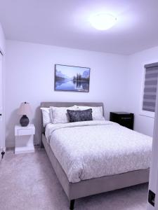 Postel nebo postele na pokoji v ubytování Cozy Haven