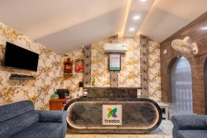 Μια τηλεόραση ή/και κέντρο ψυχαγωγίας στο Treebo Una Regency - Near AIIMS Patna
