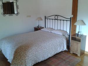 Llit o llits en una habitació de Don Baldomero Hotel Rural