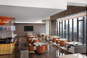 Istumisnurk majutusasutuses Home2 Suite by Hilton Yiwu World Trade Center