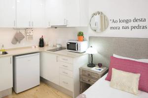 Kuchyň nebo kuchyňský kout v ubytování Very Central Studio near Subway