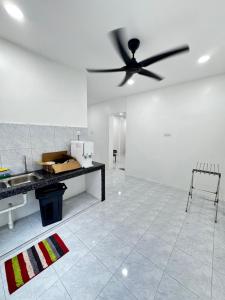 Φωτογραφία από το άλμπουμ του Dhaya Homestay 1 σε Kuantan