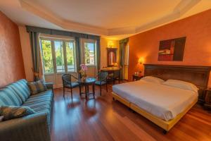 Ένα ή περισσότερα κρεβάτια σε δωμάτιο στο Hotel Teocrito