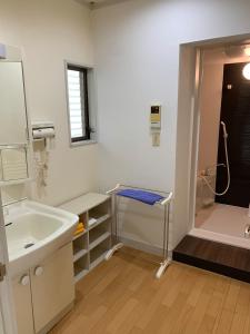 Koupelna v ubytování 楓リゾート鬼怒川温泉 优雅宽敞的日式独栋旅馆