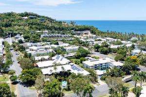 an aerial view of a resort with the ocean at Hibiscus POOL VIEW Villa 49b in Port Douglas