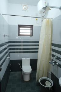 Koupelna v ubytování Ganjes Premium Villa Thekkady + 59 fotografií