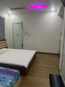 Giường trong phòng chung tại Home Sun Moon - Phan Thiết