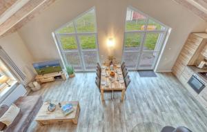 an overhead view of a living room with a table at 2 Bedroom Amazing Home In Dagebüll in Dagebüll